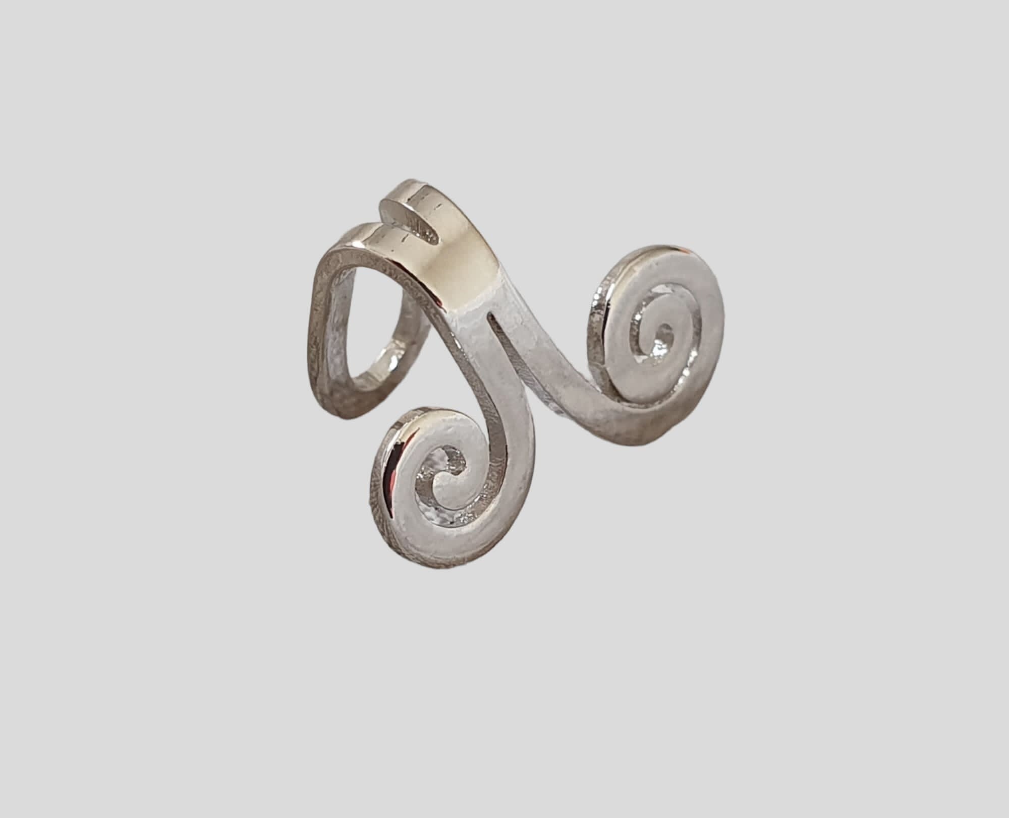 Silver swirl clip on ear cuff stud earrings