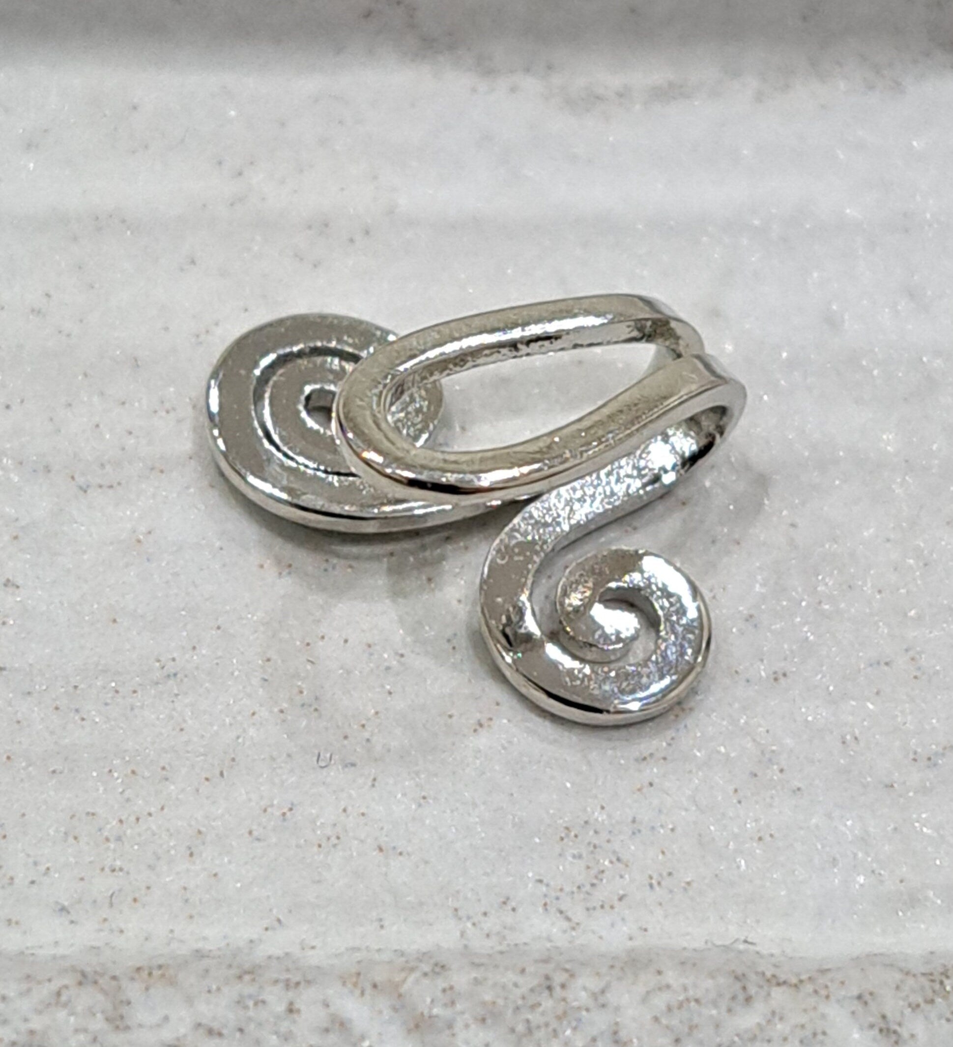 Silver swirl clip on ear cuff stud earrings