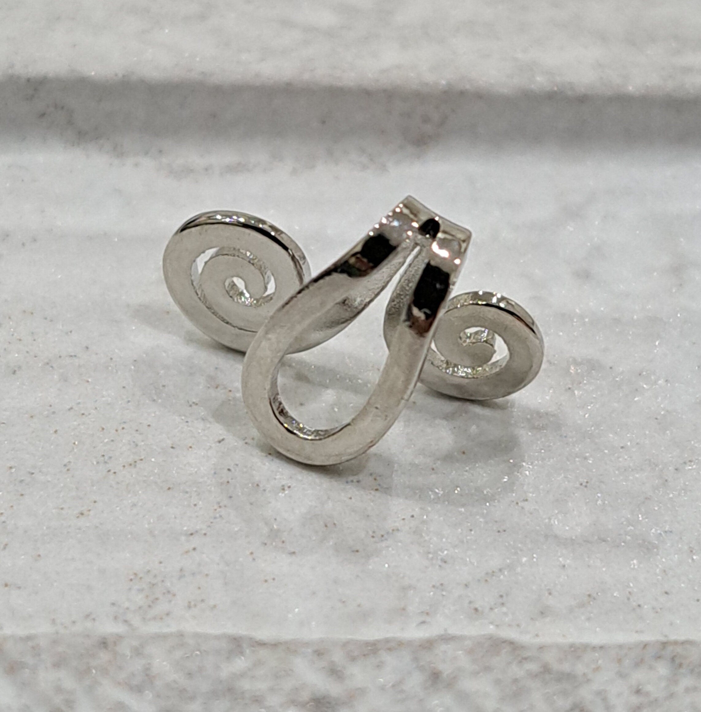 Silver swirl clip on ear cuff stud earrings