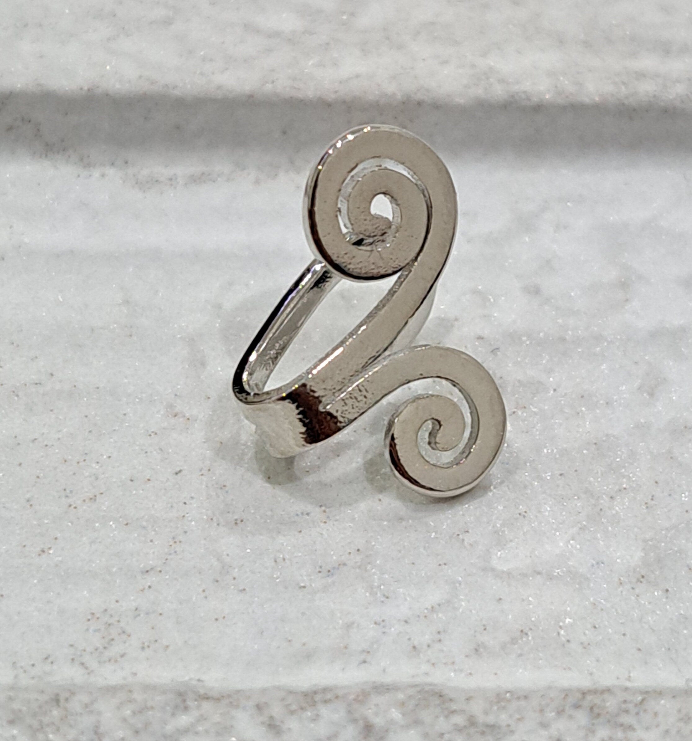 Silver swirl clip on ear cuff stud earrings