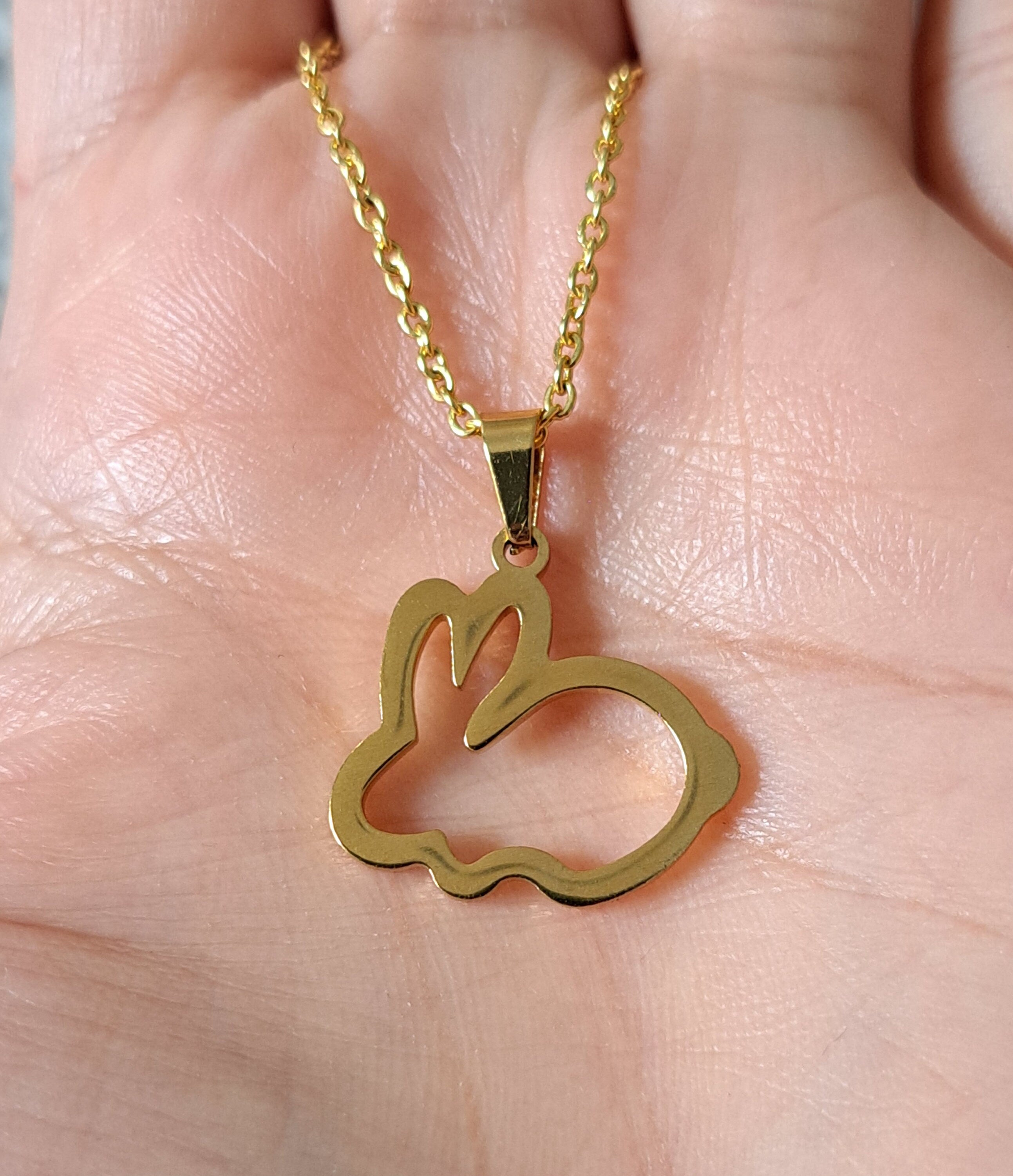 Gold Cut Out Rabbit Pendant and Necklace