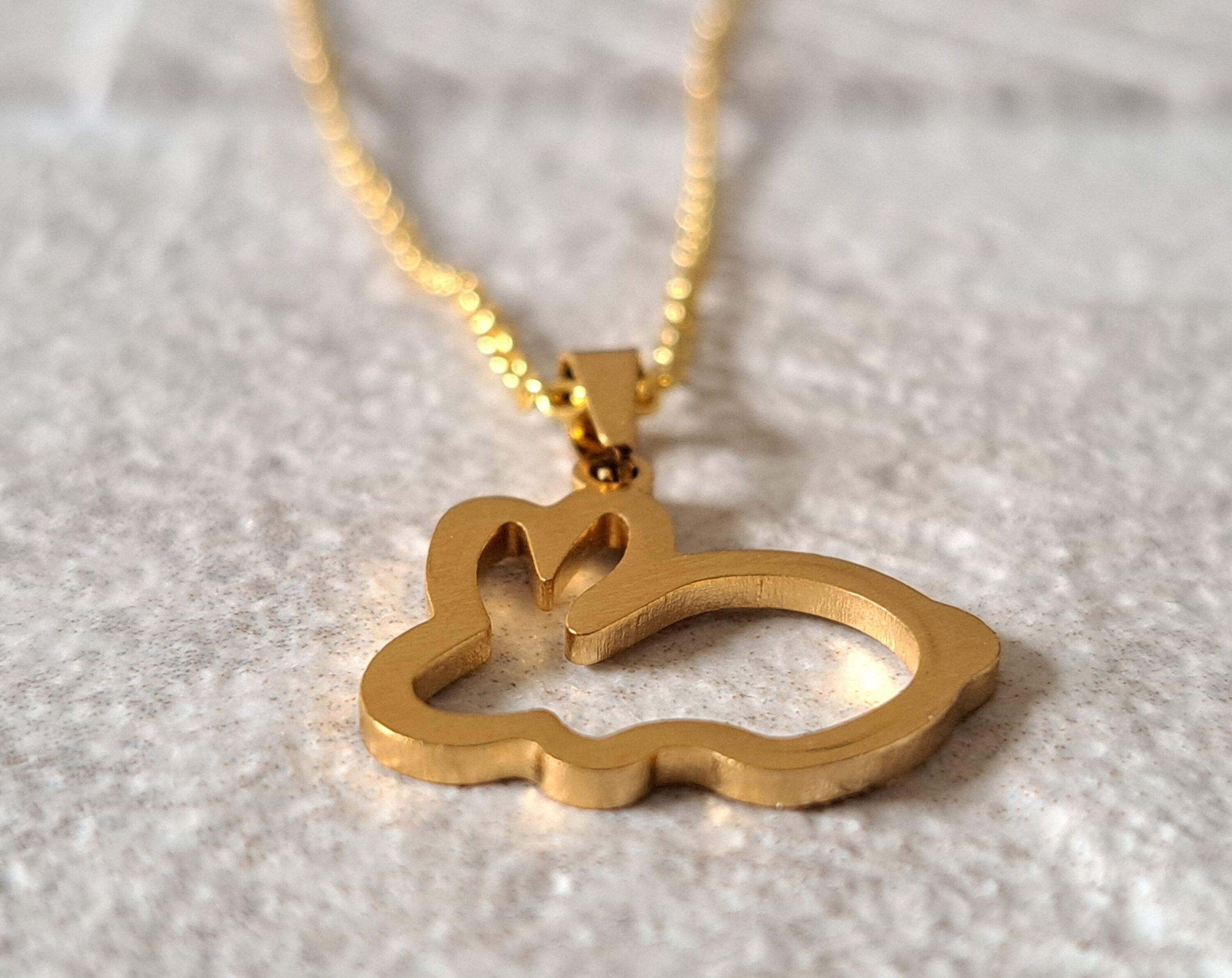Gold Cut Out Rabbit Pendant and Necklace
