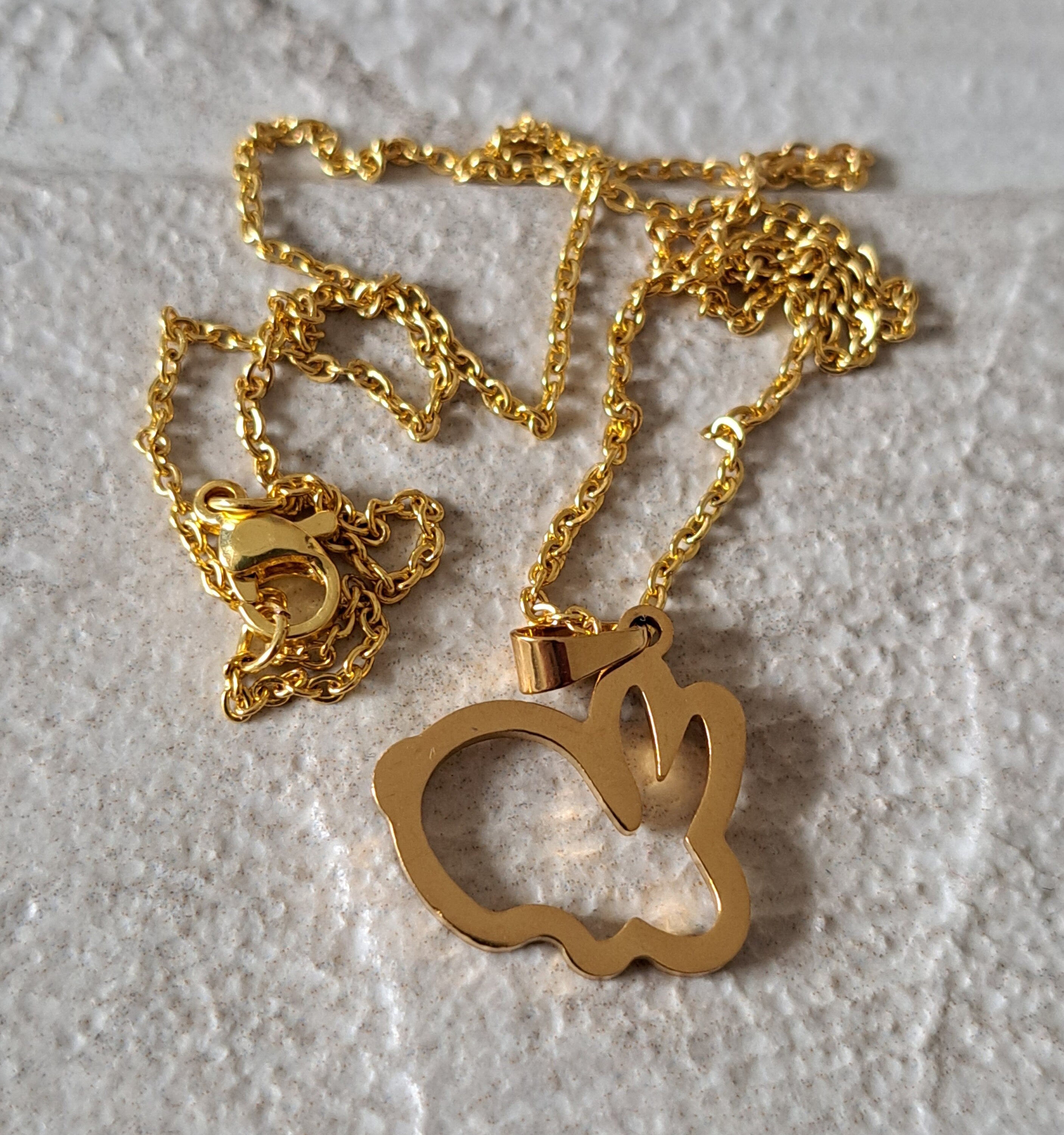 Gold Cut Out Rabbit Pendant and Necklace