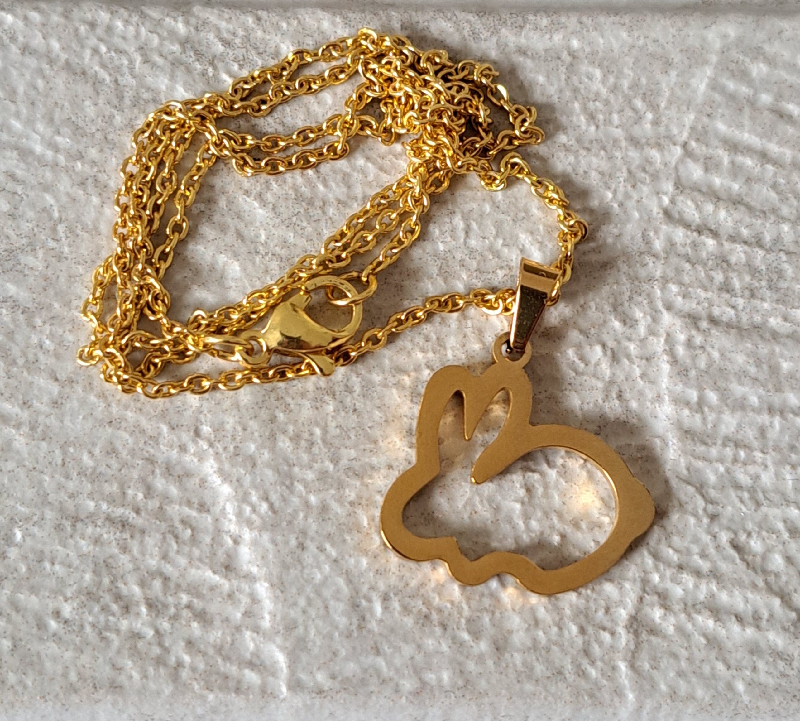 Gold Cut Out Rabbit Pendant and Necklace