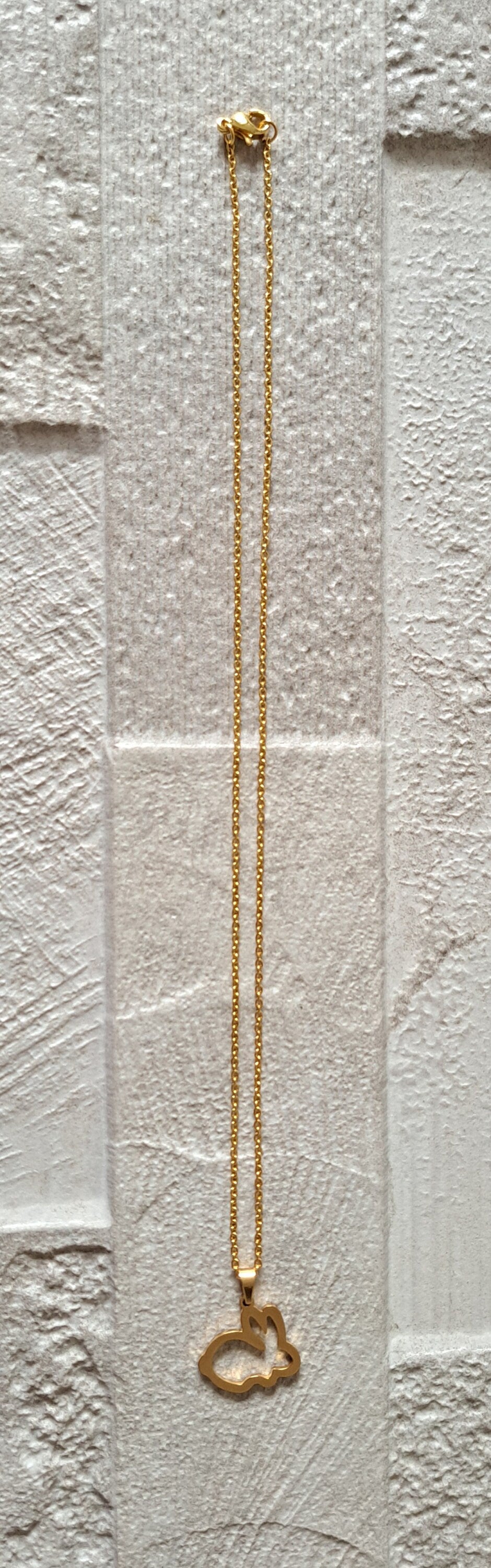 Gold Cut Out Rabbit Pendant and Necklace