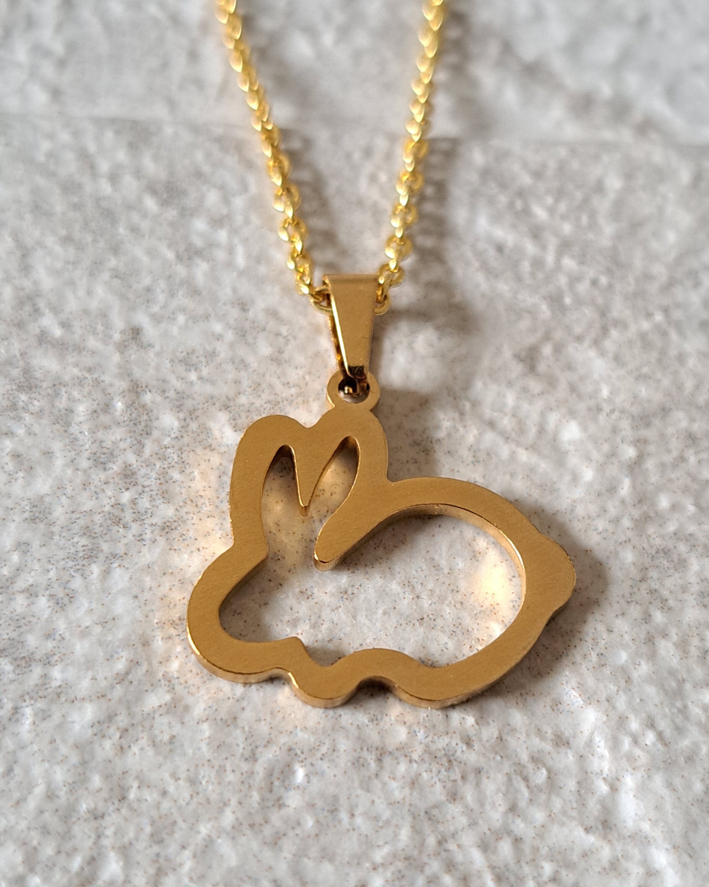 Gold Cut Out Rabbit Pendant and Necklace
