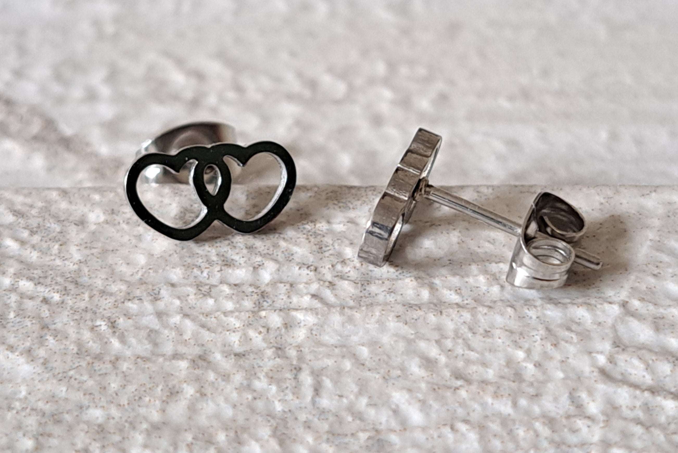Small Silver Hollow Double Heart Stud Earrings